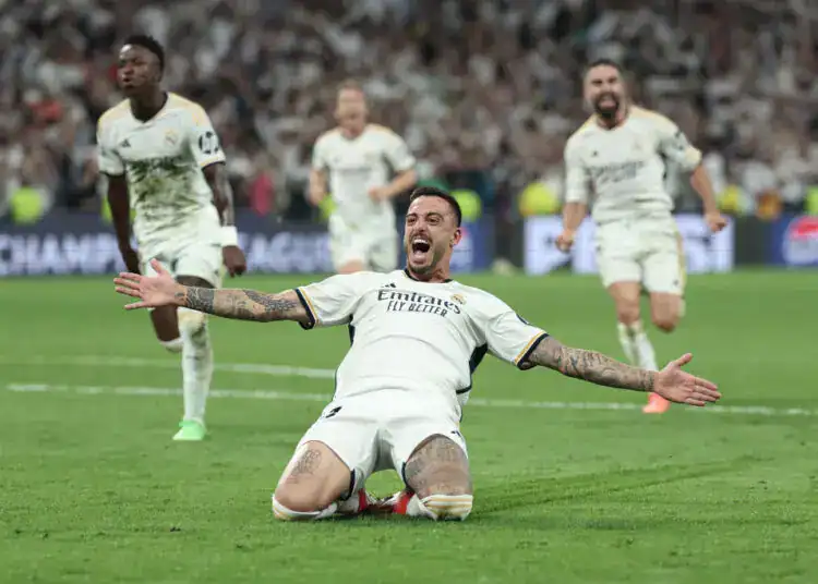 Real Madrid's Spanish forward #14 Joselu celebrates scoring during the UEFA Champions League semi final second leg football match between Real Madrid CF and FC Bayern Munich at the Santiago Bernabeu stadium in Madrid on May 8, 2024. (Photo by Thomas COEX / AFP) (Photo by THOMAS COEX/AFP via Getty Images)