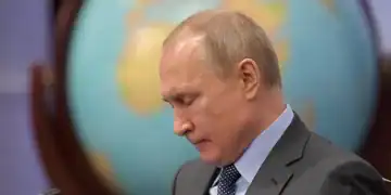 Russian President Vladimir Putin attends a meeting of guardian council of the Russian Geographic Society in St. Petersburg, Russia, Tuesday, April 23, 2019. Putin said the government will pursue an ambitious navy modernization effort. (Alexei Druzhinin, Sputnik, Kremlin Pool Photo via AP) ORG XMIT: XAZ130