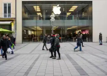 In Munich, Germany, on January 18, 2025, the Apple Store on Rosenstrasse serves as a destination for technology enthusiasts. Shoppers and visitors stroll past, reflecting the vibrant atmosphere of this part of the city. Inside, the two-story modern retail space showcases Apple's latest products, offering an interactive experience for customers. (Photo by Michael Nguyen/NurPhoto via Getty Images)