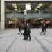 In Munich, Germany, on January 18, 2025, the Apple Store on Rosenstrasse serves as a destination for technology enthusiasts. Shoppers and visitors stroll past, reflecting the vibrant atmosphere of this part of the city. Inside, the two-story modern retail space showcases Apple's latest products, offering an interactive experience for customers. (Photo by Michael Nguyen/NurPhoto via Getty Images)