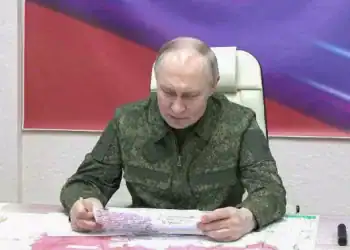 KURSK, RUSSIA - MARCH 12: (----EDITORIAL USE ONLY - MANDATORY CREDIT - 'KREMLIN PRESS OFFICE / HANDOUT' - NO MARKETING NO ADVERTISING CAMPAIGNS - DISTRIBUTED AS A SERVICE TO CLIENTS----) A screen grab from a video shows Russian President Vladimir Putin, dressed in military uniform, visited a command post in Kursk, Russia on March 12, 2025. (Photo by Kremlin Press Office / Handout/Anadolu via Getty Images)