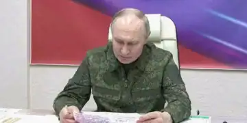 KURSK, RUSSIA - MARCH 12: (----EDITORIAL USE ONLY - MANDATORY CREDIT - 'KREMLIN PRESS OFFICE / HANDOUT' - NO MARKETING NO ADVERTISING CAMPAIGNS - DISTRIBUTED AS A SERVICE TO CLIENTS----) A screen grab from a video shows Russian President Vladimir Putin, dressed in military uniform, visited a command post in Kursk, Russia on March 12, 2025. (Photo by Kremlin Press Office / Handout/Anadolu via Getty Images)