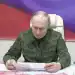 KURSK, RUSSIA - MARCH 12: (----EDITORIAL USE ONLY - MANDATORY CREDIT - 'KREMLIN PRESS OFFICE / HANDOUT' - NO MARKETING NO ADVERTISING CAMPAIGNS - DISTRIBUTED AS A SERVICE TO CLIENTS----) A screen grab from a video shows Russian President Vladimir Putin, dressed in military uniform, visited a command post in Kursk, Russia on March 12, 2025. (Photo by Kremlin Press Office / Handout/Anadolu via Getty Images)