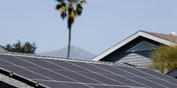 PASADENA, CALIFORNIA - FEBRUARY 25: A view of solar panels atop the roof of a home on February 25, 2025 in Pasadena, California. California officials are considering cutting household rooftop solar energy credits contending that solar customers don’t contribute a fair share to maintenance costs of the power grid. (Photo by Mario Tama/Getty Images)