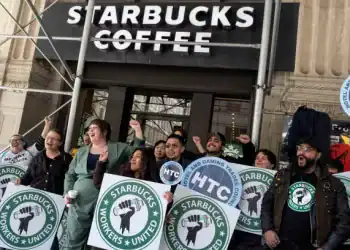 NEW YORK, NEW YORK - FEBRUARY 28: Starbucks union members and their supporters, including baristas who have just walked off the job, effectively closing a local branch, picket in front of the store, February 28, 2025 in New York City. (Photo by Andrew Lichtenstein/Corbis via Getty Images)