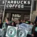NEW YORK, NEW YORK - FEBRUARY 28: Starbucks union members and their supporters, including baristas who have just walked off the job, effectively closing a local branch, picket in front of the store, February 28, 2025 in New York City. (Photo by Andrew Lichtenstein/Corbis via Getty Images)