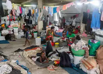 PORT-AU-PRINCE, HAITI - APRIL 16: Internally displaced persons live in makeshift tents as growing insecurity, particularly in the capital, is forcing families to flee their former shelters on several occasions in Port-au-Prince, Haiti on April 16, 2025. The citizens' demonstration scheduled for this Wednesday in Canap-Vert was canceled, as thousands of people prepared to take to the streets to protest against insecurity. According to IOM data, over one million Haitians are currently internally displaced - a figure three times higher than in 2023. Growing insecurity, particularly in the capital, is forcing families to flee repeatedly, often at the cost of deplorable living conditions, with no access to drinking water, healthcare or decent shelter. (Photo by Guerinault Louis/Anadolu via Getty Images)