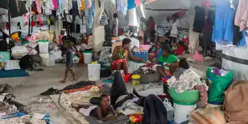 PORT-AU-PRINCE, HAITI - APRIL 16: Internally displaced persons live in makeshift tents as growing insecurity, particularly in the capital, is forcing families to flee their former shelters on several occasions in Port-au-Prince, Haiti on April 16, 2025. The citizens' demonstration scheduled for this Wednesday in Canap-Vert was canceled, as thousands of people prepared to take to the streets to protest against insecurity. According to IOM data, over one million Haitians are currently internally displaced - a figure three times higher than in 2023. Growing insecurity, particularly in the capital, is forcing families to flee repeatedly, often at the cost of deplorable living conditions, with no access to drinking water, healthcare or decent shelter. (Photo by Guerinault Louis/Anadolu via Getty Images)