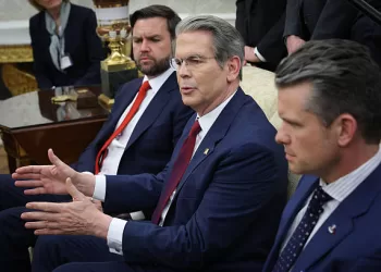 WASHINGTON, DC - APRIL 17: U.S. Treasury Secretary Scott Bessent speaks on a pending minerals agreement with Ukraine as he, Vice President JD Vance (L) and and Defense Secretary Pete Hegseth (R) join U.S. President Donald Trump and Italian Prime Minister Giorgia Meloni in the Oval Office at the White House on April 17, 2025 in Washington, DC. Leader of the far-right Brothers of Italy party, Meloni is in Washington to discuss a range of bilateral issues, negotiate the 20 percent “reciprocal” tariff Trump imposed on European imports to the U.S. and to discuss pharmaceutical imports. (Photo by Win McNamee/Getty Images)