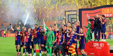 SEVILLE, SPAIN - APRIL 26: Ronald Araujo and Marc-Andre ter Stegen of FC Barcelona lift the Copa del Rey trophy after the team's victory in the Copa del Rey Final match between FC Barcelona and Real Madrid at Estadio de La Cartuja on April 26, 2025 in Seville, Spain. (Photo by Fran Santiago/Getty Images)