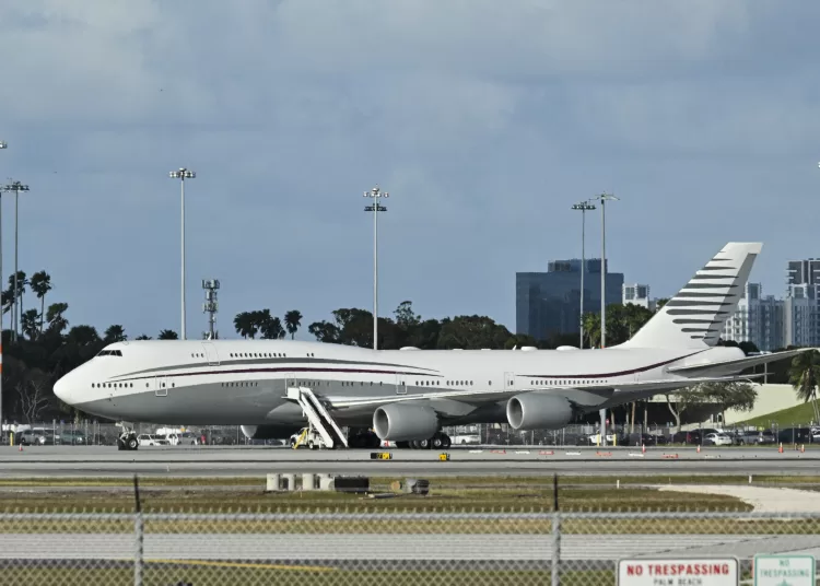 In this February 15, 2025 a Qatari Boeing 747 sits on the tarmac of Palm Beach International airport after US President Donald Trump toured the aircraft on February 15, 2025. Donald Trump plans to accept a luxury Boeing jet from the Qatari royal family for use as Air Force One and then continue flying in it after his tenure, despite strict rules on US presidential gifts, media reported May 11, 2025. Calling the plane a "flying palace," ABC News, which first reported the story, said the Boeing 747-8 jumbo jet would possibly be the most expensive gift ever received by the American government. (Photo by ROBERTO SCHMIDT / AFP)