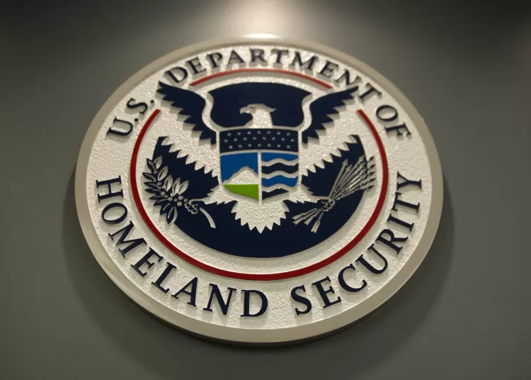 (FILES) The seal of the Department of Homeland Security is seen at US Immigration and Customs Enforcement in Washington, DC, February 25, 2015. When armed immigration agents made a surprise visit earlier this month to Pupatella, a trendy pizzeria in the US capital's Dupont neighborhood, they may not have made any arrests, but they delivered a clear message. The show of force, part of an "enhanced operation" by President Donald Trump's hardline administration, has had ripple effects through an industry reliant on immigrant labor, owners and others in the sector say. The Immigration and Customs Enforcement (ICE) agency said it had arrested 189 undocumented migrants after handing out 187 such notices in the Washington area between May 6 and May 9. (Photo by SAUL LOEB / AFP)