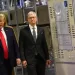 (FILES) US President Donald Trump (L) and Apple CEO Tim Cook tour the Flextronics computer manufacturing facility where Apple's Mac Pros are assembled in Austin, Texas, on November 20, 2019. US President Donald Trump ratcheted up the US trade war on May 23, 2025, threatening to impose a new 25 percent levy against Apple, and a 50 percent tariff on the European Union. The president said Apple had failed to move iPhone production to the United States despite his repeated requests, and he threatened new duties of "at least" 25 percent if they did not comply. (Photo by MANDEL NGAN / AFP)
