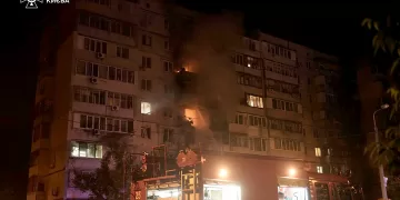 This handout photograph taken and released by the Ukrainian State Emergency Service press service on May 24, 2025, shows firefighters extinguishing a blaze in a residential building following Russian strike in Kyiv, amid Russian invasion in Ukraine. At least eight people were wounded in a drone and missile attack on Kyiv on May 24, 2025, city authorities said, just as Russia and Ukraine were in the middle of a major prisoner swap. The head of Kyiv's civil and military administration, Tymur Tkachenko, reported fires and fallen debris in several parts of the Ukrainian capital, after AFP journalists heard explosions overnight. (Photo by Handout / Ukrainian State Emergency Service Press Service / AFP) / RESTRICTED TO EDITORIAL USE - MANDATORY CREDIT "AFP PHOTO / UKRAINIAN STATE EMERGENCY SERVICE PRESS SERVICE" - HANDOUT - NO MARKETING NO ADVERTISING CAMPAIGNS - DISTRIBUTED AS A SERVICE TO CLIENTS