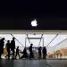 SAN DIEGO, CALIFORNIA - MAY 1: People walk by an Apple store at the Westfield UTC shopping center on May 1, 2025 in San Diego, California. (Photo by Kevin Carter/Getty Images)