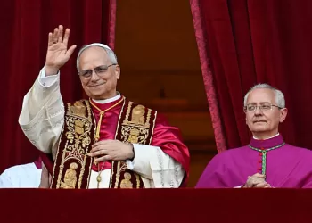 VATICAN CITY, VATICAN - MAY 08: (EDITOR NOTE: STRICTLY EDITORIAL USE ONLY - NO MERCHANDISING). Newly elected Pope Leo XIV, cardinal Robert Prevost addresses the crowd on the main central loggia balcony overlooking St Peter's Square on May 08, 2025 in Vatican City, Vatican. White smoke was seen over the Vatican early this evening as the Conclave of Cardinals took just two days to elect Cardinal Robert Francis Prevost, who will be known as Pope Leo  (Leone)  XIV, as the 267th Supreme Pontiff after the death of Pope Francis on Easter Monday. (Photo by Simone Risoluti - Vatican Media via Vatican Pool/Getty Images)