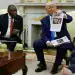 WASHINGTON, DC - MAY 21: U.S. President Donald Trump holds up a printed article from "American Thinker" while accusing South Africa President Cyril Ramaphosa of state-sanctioned violence against white farmers in South Africa during a press availability in the Oval Office at the White House on May 21, 2025 in Washington, DC. Relations between the two countries have been strained since Trump signed an executive order in February that claimed white South Africans are the victims of government land confiscation and race-based “genocide,” while admitting some of those Afrikaners as refugees to the United States. Trump also halted all foreign aid to South Africa and expelled the country’s Ambassador to the U.S., Ebrahim Rasool. (Photo by Chip Somodevilla/Getty Images)