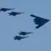 BAYONNE, NJ - JULY 4: A B2 bomber leads a group of fighter jets during a military flyover as part of Independence Day festivities on July 4, 2020 as seen from Bayonne, New Jersey. (Photo by Gary Hershorn/Getty Images)