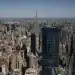 Buildings in the Manhattan skyline in New York, US, on Saturday, May 10, 2025. New York City officials cut their forecast for the number of international tourists this year by 17%, saying President Donald Trumps tariffs and hard-line policies on immigration are deterring visitors. Photographer: Yuki Iwamura/Bloomberg via Getty Images