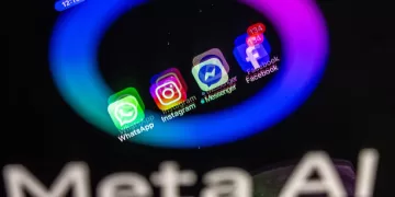 dpatop - ILLUSTRATION - 27 May 2025, Mecklenburg-Western Pomerania, Schwerin: The Facebook, Messenger, Instagram and WhatsApp apps are shown on a smartphone display that reflects the logo of the AI application Meta AI. The Facebook group Meta can now start training its artificial intelligence systems on a large scale with user data from Germany. Photo: Jens Büttner/dpa (Photo by Jens Büttner/picture alliance via Getty Images)