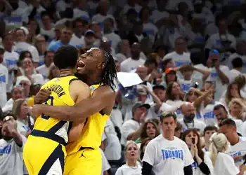 OKLAHOMA CITY, OKLAHOMA - JUNE 05: Tyrese Haliburton #0 of the Indiana Pacers congratulated by Aaron Nesmith #23 after scoring a basket against the Oklahoma City Thunder during the fourth quarter in Game One of the 2025 NBA Finals at Paycom Center on June 05, 2025 in Oklahoma City, Oklahoma. NOTE TO USER: User expressly acknowledges and agrees that, by downloading and or using this photograph, User is consenting to the terms and conditions of the Getty Images License Agreement. (Photo by Matthew Stockman/Getty Images)