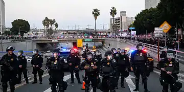 LOS ANGELES, CALIFORNIA - JUNE 10: California Highway Patrol officers and police are seen as curfew was declared by Governor Newsom between 8.00PM to 6:00AM after mass anti-ICE protest in Los Angeles, California on June 10, 2025 amid protests over immigration raids. (Photo by Tayfun Coskun/Anadolu via Getty Images)