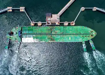 QINGDAO, CHINA - JUNE 12, 2025 - An oil tanker fully loaded with imported crude oil docked at the Qingdao Port terminal with the assistance of a tugboat in Qingdao City, Shandong Province, China on June 12, 2025. (Photo credit should read CFOTO/Future Publishing via Getty Images)