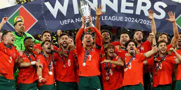 MUNICH, GERMANY - JUNE 08: Cristiano Ronaldo of Portugal lifts the UEFA Nations League trophy after his team's victory in the UEFA Nations League 2025 final match between Portugal and Spain at Munich Football Arena on June 08, 2025 in Munich, Germany. (Photo by Alexander Hassenstein/Getty Images)