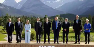 (From L) European Council President Antonio Costa, Japanese Prime Minister Shigeru Ishiba, Italian Prime Minister Giorgia Meloni, French President Emmanuel Macron, Canadian Prime Minister Mark Carney, U.S. President Donald Trump, British Prime Minister Keir Starmer, German Chancellor Friedrich Merz and European Commission President Ursula von der Leyen pose for a group photo at the Group of Seven summit venue in Kananaskis, Canada, on June 16, 2025. (Photo by Kyodo News via Getty Images)