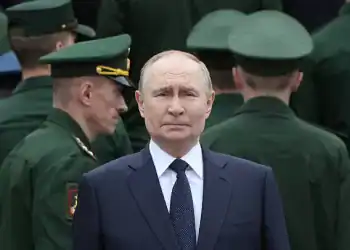 MOSCOW, RUSSIA - JUNE 22:  (RUSSIA OUT) Russian President Vladimir Putin, surrounded by armed forces's officers, attends a wreath laying ceremony to the Unknown Soldier's Tomb in the Alexander Garden along the Kremlin wall on June 22, 2025 in Moscow, Russia. The day commemorates Operation Barbarossa, in which the Axis powers invaded the Soviet Union during World War II. (Photo by Contributor/Getty Images)