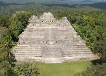 he ruined Maya city of Caracol in Belize is dominated by the Caana pyramid, which was once a temple. The newfound tomb was in a raised area immediately to the right, underneath the modern canopy of trees (Image credit: Caracol Archaeological Project, University of Houston)