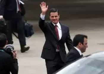 BUENOS AIRES, ARGENTINA - NOVEMBER 29: President of Mexico Enrique Peña Nieto waves as he arrives to Buenos Aires for G20 Leaders' Summit 2018 at Ministro Pistarini International Airport on November 29, 2018 in Ezeiza, Buenos Aires, Argentina. Leaders of the G20 group of nations are meeting for the November 30th - December 1st summit. (Photo by Daniel Jayo/Getty Images)