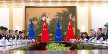BEIJING, CHINA - FEBRUARY 14: European Commission President Jose Manuel Barroso (2nd R), and European Council President Herman Van Rompuy (R) hold talks with Chinese Premier Wen Jiabao (3rd L) at the Great Hall of the People during the European Union (EU)-China summit on February 14, 2012 in Beijing, China. The talks are to focus on the Eurozone financial crisis, with Wen stating that China is ready to increase "its participation in resolving the EU debt problems". (Photo by How Hwee Young - Pool/Getty Images)