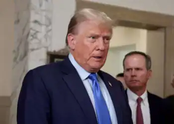 UNITED STATES -October 2: A visible upset former President Donald Trump speaks to the News Photographers posted outside Court Room 300 at Manhattan Supreme Court Monday October 2, 2023. The former President held a impromptu Press Conference outside the courtroom and did not have any kinds words to the Judge and NY Attorney General Letitia James and called the process a "scam, " a sham".  (Photo by Luiz C. Ribeiro for NY Daily News via Getty Images)