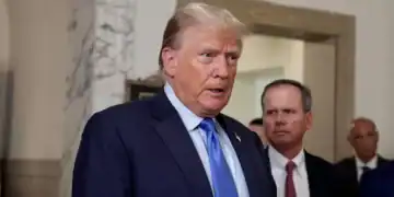 UNITED STATES -October 2: A visible upset former President Donald Trump speaks to the News Photographers posted outside Court Room 300 at Manhattan Supreme Court Monday October 2, 2023. The former President held a impromptu Press Conference outside the courtroom and did not have any kinds words to the Judge and NY Attorney General Letitia James and called the process a "scam, " a sham".  (Photo by Luiz C. Ribeiro for NY Daily News via Getty Images)