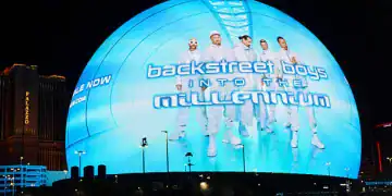 LAS VEGAS, NEVADA- MARCH 12: An advertisement for the Backstreet Boys: Into The Millennium concert is displayed on the Sphere, a music and entertainment venue,  on March 12, 2025 in Las Vegas, Nevada. (Photo by Kevin Carter/Getty Images)