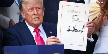 WASHINGTON, DC - JULY 04: U.S. President Donald Trump, joined by Republican lawmakers, signs the One, Big Beautiful Bill Act into law during an Independence Day military family picnic on the South Lawn of the White House on July 04, 2025 in Washington, DC. After weeks of negotiations with Republican holdouts Congress passed the One, Big Beautiful Bill Act into law, President Trump’s signature tax and spending bill. The bill makes permanent President Donald Trump’s 2017 tax cuts, increase spending on defense and immigration enforcement and temporarily cut taxes on tips, while cutting funding for Medicaid, food assistance and other social safety net programs. (Photo by Samuel Corum/Getty Images)