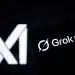 CHONGQING, CHINA - JULY 10: In this photo illustration, the logo of Grok 4 is displayed on smartphone screen with xAI logo in the background on July 10, 2025 in Chongqing, China. Elon Musk on July 10 unveiled Grok 4, a new version of his X platform's AI chatbot. (Photo by Li Hongbo/VCG via Getty Images)