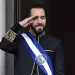 (FILES) El Salvador's President Nayib Bukele salutes during the military parade after being sworn in at the National Palace in downtown San Salvador on June 1, 2024. El Salvador's ruling-party-dominated Congress is discussing indefinite presidential reelection on July 31, 2025, aiming towards President Nayib Bukele's continued presidency. This reform also proposes extending the term of office from five to six years. (Photo by Marvin Recinos / AFP)