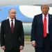 US President Donald Trump (R) and Russian President Vladimir Putin pose on a podium on the tarmac after arrival at Joint Base Elmendorf-Richardson in Anchorage, Alaska, on August 15, 2025. Putin is in Alaska at the invitation of Trump in his first visit to a Western country since he ordered the 2022 invasion of Ukraine that has killed tens of thousands of people. (Photo by ANDREW CABALLERO-REYNOLDS / AFP)