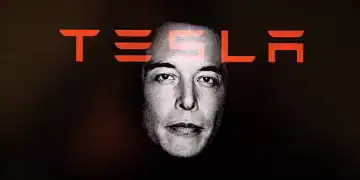 Double exposure photograph of a portrait of Elon Musk and the name of his company Tesla at Kerlouan in Brittany in France on May 21 2025. (Photo by Vincent Feuray / Hans Lucas / Hans Lucas via AFP) (Photo by VINCENT FEURAY/Hans Lucas/AFP via Getty Images)