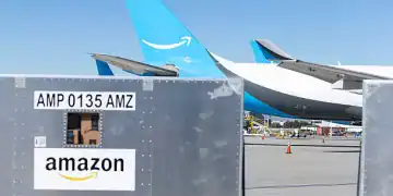 San Bernadino, CA - July 24: Prime Air airplanes sit on the tarmac waiting to be loaded with cargo at an Amazon Air Hub Thursday, July 24, 2025 in San Bernadino, CA. (Luke Johnson / Los Angeles Times via Getty Images)