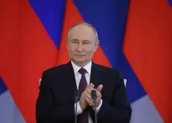 MOSCOW, RUSSIA - JULY 31 (RUSSIA OUT) Russian President Vladimir Putin applauds during Russian-Laotian talks at the Kremlin on July 31, 2025 in Moscow, Russia. President of Laos Sisoulith is on an official visit to Russia. (Photo by Contributor/Getty Images)