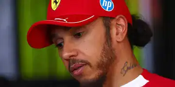 BUDAPEST, HUNGARY - AUGUST 01: Lewis Hamilton of Great Britain and Scuderia Ferrari is interviewed during practice ahead of the F1 Grand Prix of Hungary at Hungaroring on August 01, 2025 in Budapest, Hungary. (Photo by Joe Portlock/Getty Images)