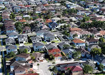 MIAMI, FLORIDA - AUGUST 01: An aerial view of single family homes on August 01, 2025 in Miami, Florida. Home sales have fallen across South Florida as high interest rates and other factors have weighed on the market. (Photo by Joe Raedle/Getty Images)