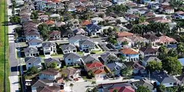 MIAMI, FLORIDA - AUGUST 01: An aerial view of single family homes on August 01, 2025 in Miami, Florida. Home sales have fallen across South Florida as high interest rates and other factors have weighed on the market. (Photo by Joe Raedle/Getty Images)