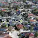 MIAMI, FLORIDA - AUGUST 01: An aerial view of single family homes on August 01, 2025 in Miami, Florida. Home sales have fallen across South Florida as high interest rates and other factors have weighed on the market. (Photo by Joe Raedle/Getty Images)