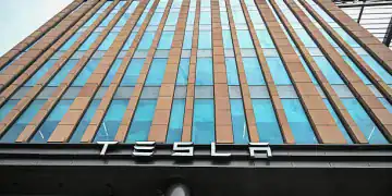 The new Tesla Inc. store in New Delhi, India, on Monday, Aug. 11, 2025. Tesla opened its first India showroom in Mumbai last month as Elon Musk's electric-vehicle maker looks to tap new markets and offset slowing sales where it's already well established. Photographer: Prakash Singh/Bloomberg via Getty Images