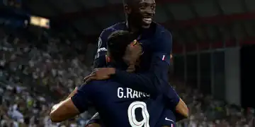 UDINE, ITALY - AUGUST 13: Goncalo Ramos of Paris Saint-Germain celebrates scoring his team's second goal with teammate Ousmane Dembele during the UEFA Super Cup 2025 match between Paris Saint-Germain and Tottenham Hotspur at Stadio Friuli on August 13, 2025 in Udine, Italy. (Photo by Claudio Villa/Getty Images)