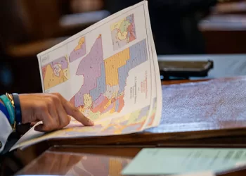 AUSTIN, TEXAS - AUGUST 20: Texas Republican Rep. Marc LaHood views a map during a House meeting in the State Capitol on August 20, 2025 in Austin, Texas. Texas lawmakers continue convening during a second special session over a newly introduced plan to redraw Texas' congressional maps ahead of the 2026 midterm elections. (Photo by Brandon Bell/Getty Images)